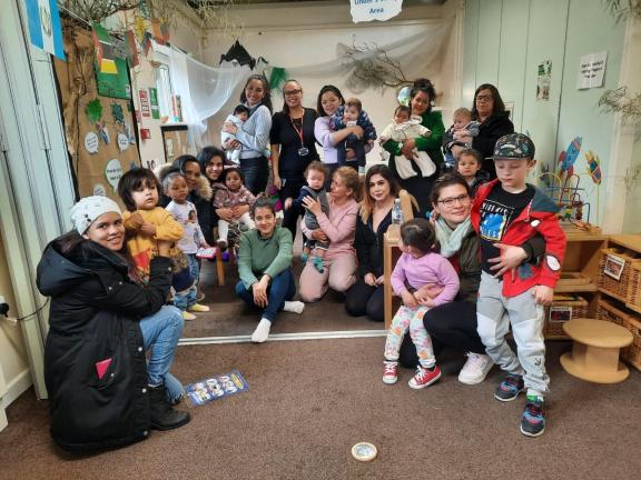 Parents and children smiling