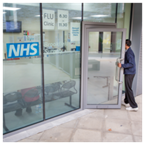 A man walking into a health clinic