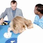 A group of people eating around a table