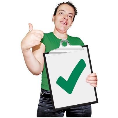 A man giving a thumbs-up and holding a clipboard with a big green tick on it