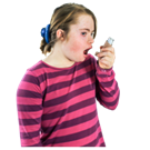 A woman using an inhaler