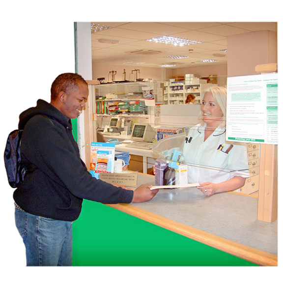 A man at a pharmacy counter