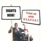 Two people with protest signs