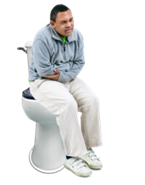 A man sitting on a toilet 