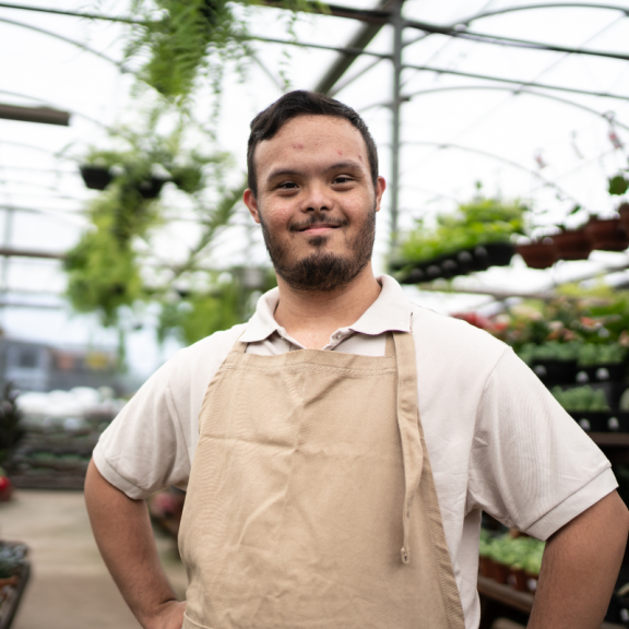 young person at work in a plant nursery