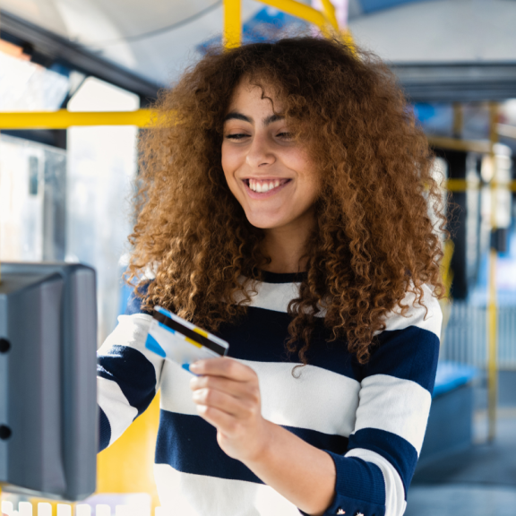 Young person paying for the public bus