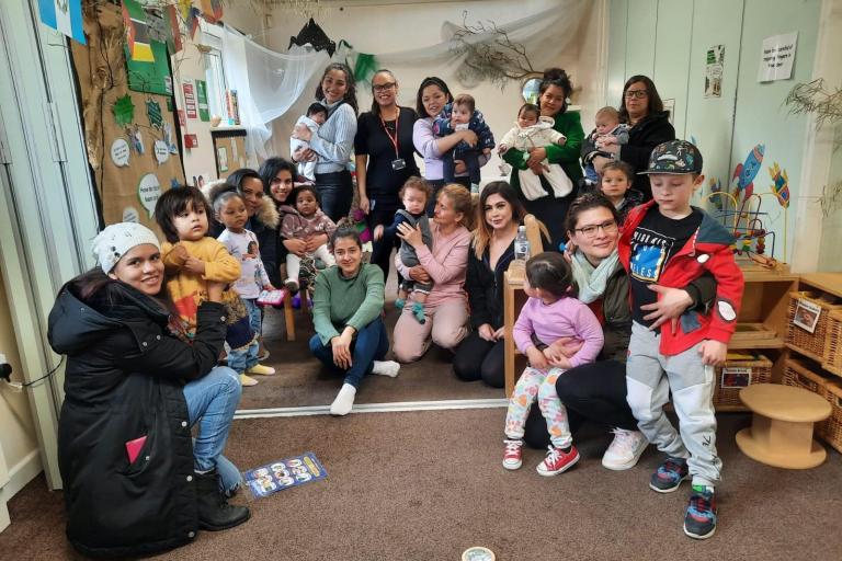 Parents and children smiling