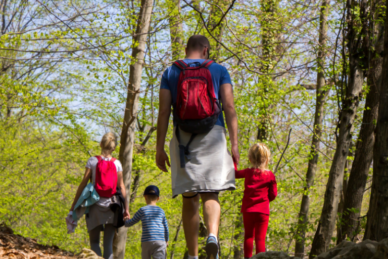 Family walking outside in nature