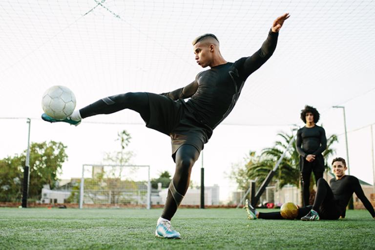 Young men playing football