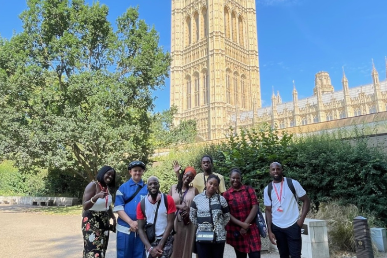 youth council members standing outside of parliament