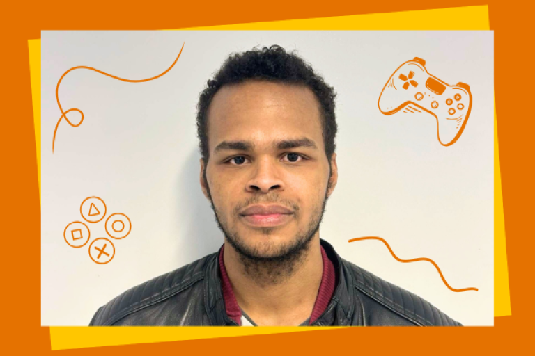 young adult smiling with orange video game elements