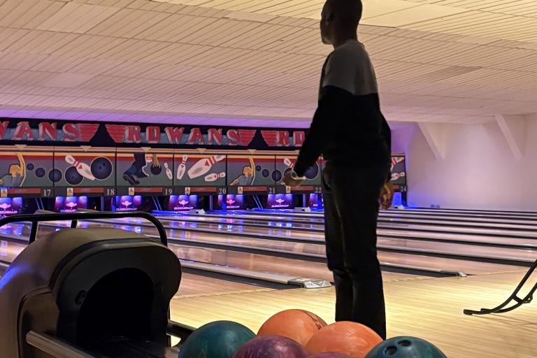 young person bowling