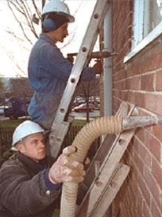  Instalación de aislamiento de pared de cavidad